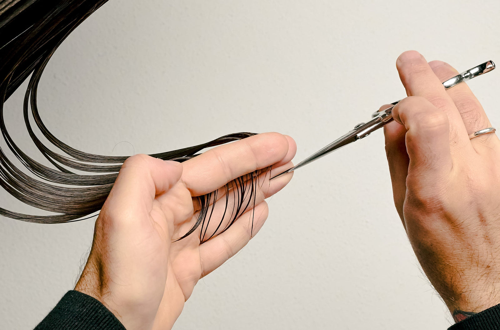 hair being cut by a stylist