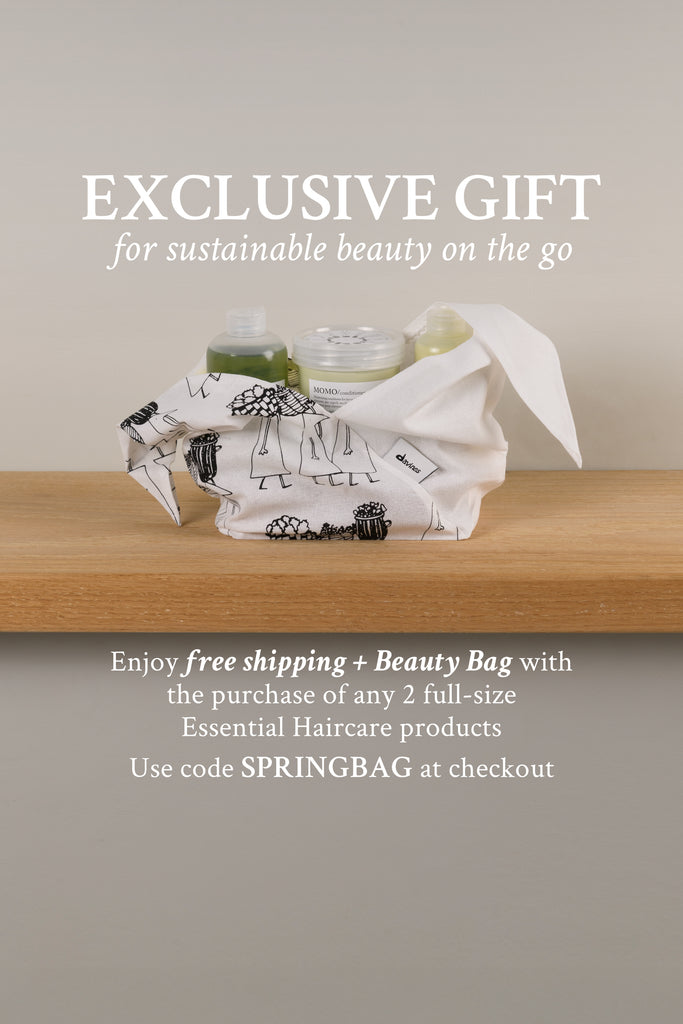 image of Davines Beauty Bag. Text reads: EXCLUSIVE GIFT: for sustainable beauty on the go. Enjoy free shipping + Beauty Bag with the purchase of any 2 full-size Essential Haircare products. Use code SPRINGBAG at checkout